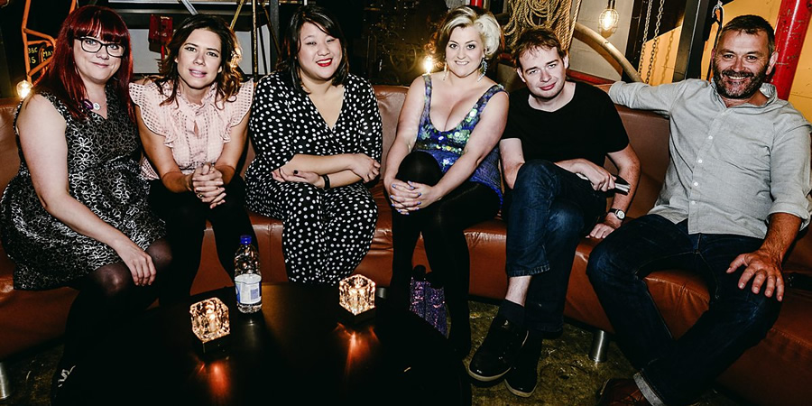 Stand-Up For Radio Wales. Image shows from L to R: Angela Barnes, Lou Sanders, Evelyn Mok, Kiri Pritchard-McLean, Matt Rees, Tudur Owen. Stand-Up For Radio Wales. Image shows from L to R: Angela Barnes, Lou Sanders, Evelyn Mok, Kiri Pritchard-McLean, Matt Rees, Tudur Owen.