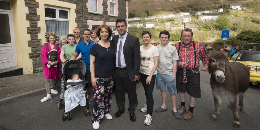 Stella. Image shows from L to R: Nadine (Karen Paullada), Aunty Brenda (Di Botcher), Little Alan (Daniel Gammond), Karl (Julian Lewis Jones), Luke (Craig Gallivan), Bobby (Aled Pugh), Stella (Ruth Jones), Michael Jackson (Patrick Baladi), Cheryl (Clare Hingott), Ben (Justin Davies), Glen Brennig (Dafydd Hywel). Copyright: Tidy Productions. Stella. Image shows from L to R: Nadine (Karen Paullada), Aunty Brenda (Di Botcher), Little Alan (Daniel Gammond), Karl (Julian Lewis Jones), Luke (Craig Gallivan), Bobby (Aled Pugh), Stella (Ruth Jones), Michael Jackson (Patrick Baladi), Cheryl (Clare Hingott), Ben (Justin Davies), Glen Brennig (Dafydd Hywel). Copyright: Tidy Productions.