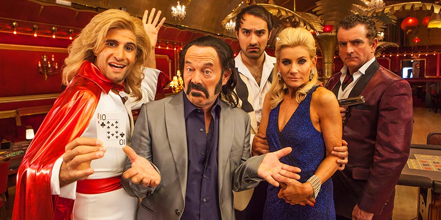 SunTrap. Image shows from L to R: Woody (Kayvan Novak), Senor Big (Keith Allen), Zorro (Jamie Demetriou), Coco (Michelle Collins), Mr De Luca (Martin Marquez). Copyright: Happy Tramp Productions. SunTrap. Image shows from L to R: Woody (Kayvan Novak), Senor Big (Keith Allen), Zorro (Jamie Demetriou), Coco (Michelle Collins), Mr De Luca (Martin Marquez). Copyright: Happy Tramp Productions.