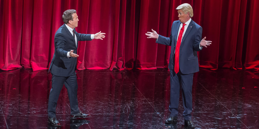 Tonight At The London Palladium. Image shows from L to R: Bradley Walsh, Donald Trump (Mike Osman). Copyright: ITV Studios. Tonight At The London Palladium. Image shows from L to R: Bradley Walsh, Donald Trump (Mike Osman). Copyright: ITV Studios.