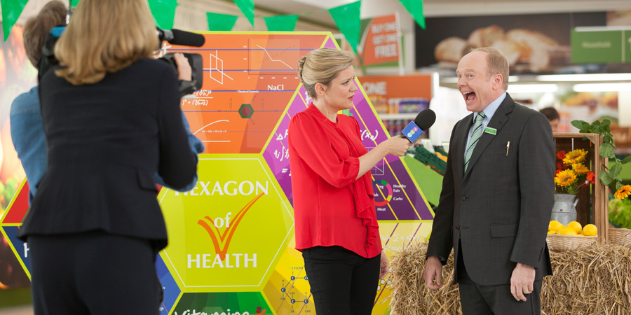 Trollied. Image shows from L to R: Wendy (Olivia Poulet), Gavin (Jason Watkins). Copyright: Roughcut Television. Trollied. Image shows from L to R: Wendy (Olivia Poulet), Gavin (Jason Watkins). Copyright: Roughcut Television.