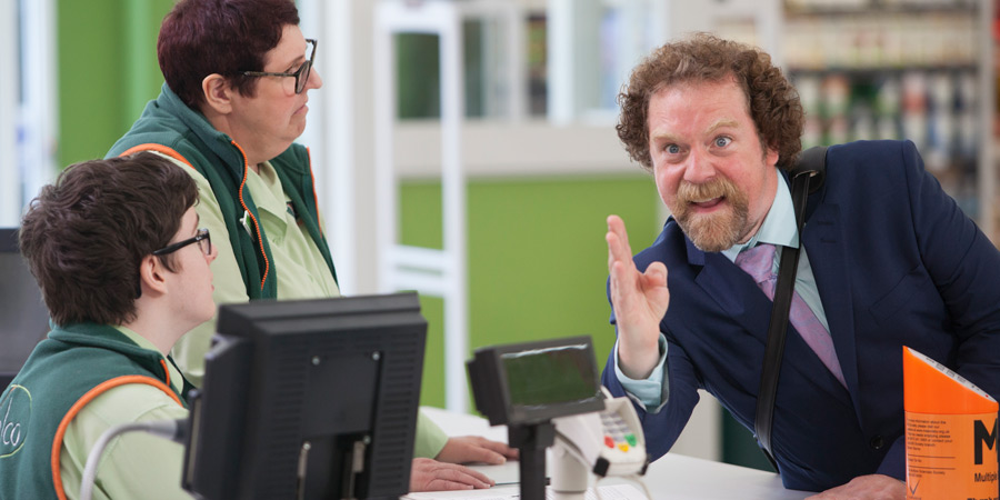 Trollied. Image shows from L to R: Harry (Jack Carroll), Sue (Lorraine Cheshire), Duncan Trench (Rufus Hound). Copyright: Roughcut Television. Trollied. Image shows from L to R: Harry (Jack Carroll), Sue (Lorraine Cheshire), Duncan Trench (Rufus Hound). Copyright: Roughcut Television.