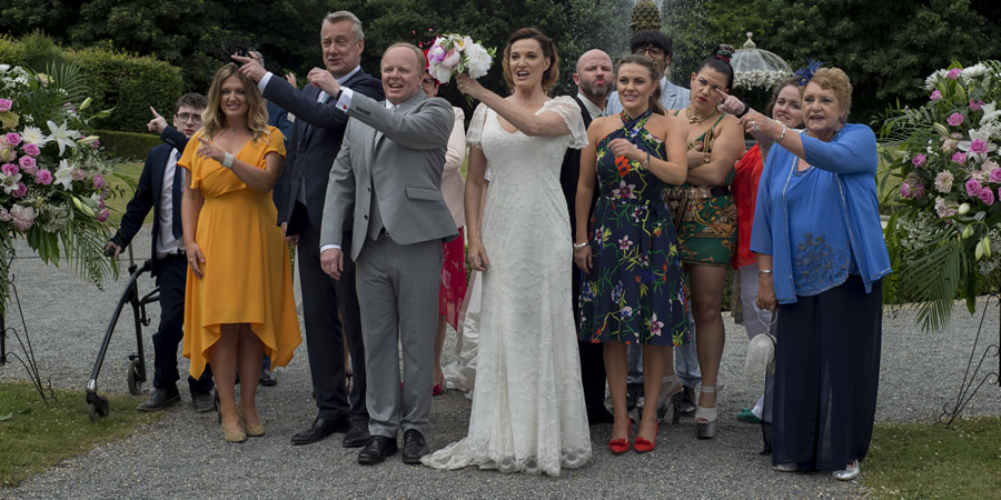 Trollied. Image shows from L to R: Harry (Jack Carroll), Linda (Faye McKeever), Brian (Stephen Tompkinson), Gavin (Jason Watkins), Cheryl (Sarah Parish), Colin (Carl Rice), Katie (Chanel Cresswell), Shai (Nikhil Parmar), Lisa (Beverly Rudd), Donna (Jessica Gunning), Margaret (Rita May). Copyright: Roughcut Television. Trollied. Image shows from L to R: Harry (Jack Carroll), Linda (Faye McKeever), Brian (Stephen Tompkinson), Gavin (Jason Watkins), Cheryl (Sarah Parish), Colin (Carl Rice), Katie (Chanel Cresswell), Shai (Nikhil Parmar), Lisa (Beverly Rudd), Donna (Jessica Gunning), Margaret (Rita May). Copyright: Roughcut Television.