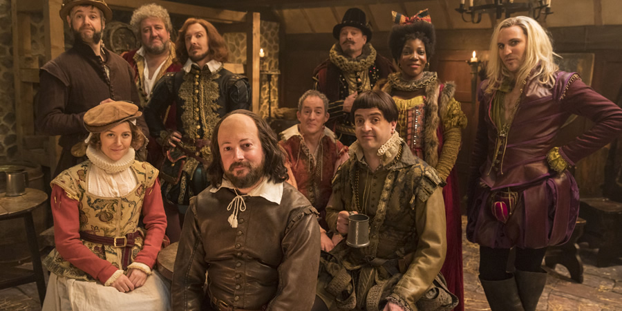 Upstart Crow. Image shows from L to R: Bottom (Rob Rouse), Kate (Gemma Whelan), Burbage (Steve Speirs), Marlowe (Tim Downie), Will Shakespeare (David Mitchell), Condell (Dominic Coleman), Sir Robert Greene (Mark Heap), Kempe (Spencer Jones), Lucy (Jocelyn Jee Esien), Morley (Noel Fielding). Copyright: BBC. Upstart Crow. Image shows from L to R: Bottom (Rob Rouse), Kate (Gemma Whelan), Burbage (Steve Speirs), Marlowe (Tim Downie), Will Shakespeare (David Mitchell), Condell (Dominic Coleman), Sir Robert Greene (Mark Heap), Kempe (Spencer Jones), Lucy (Jocelyn Jee Esien), Morley (Noel Fielding). Copyright: BBC.