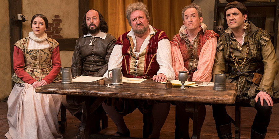 Upstart Crow. Image shows from L to R: Kate (Gemma Whelan), Will Shakespeare (David Mitchell), Burbage (Steve Speirs), Condell (Dominic Coleman), Kempe (Spencer Jones). Copyright: BBC. Upstart Crow. Image shows from L to R: Kate (Gemma Whelan), Will Shakespeare (David Mitchell), Burbage (Steve Speirs), Condell (Dominic Coleman), Kempe (Spencer Jones). Copyright: BBC.