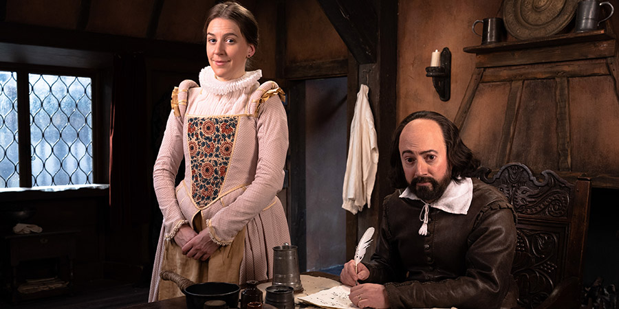Upstart Crow. Image shows from L to R: Kate (Gemma Whelan), Will Shakespeare (David Mitchell). Copyright: BBC Studios. Upstart Crow. Image shows from L to R: Kate (Gemma Whelan), Will Shakespeare (David Mitchell). Copyright: BBC Studios.