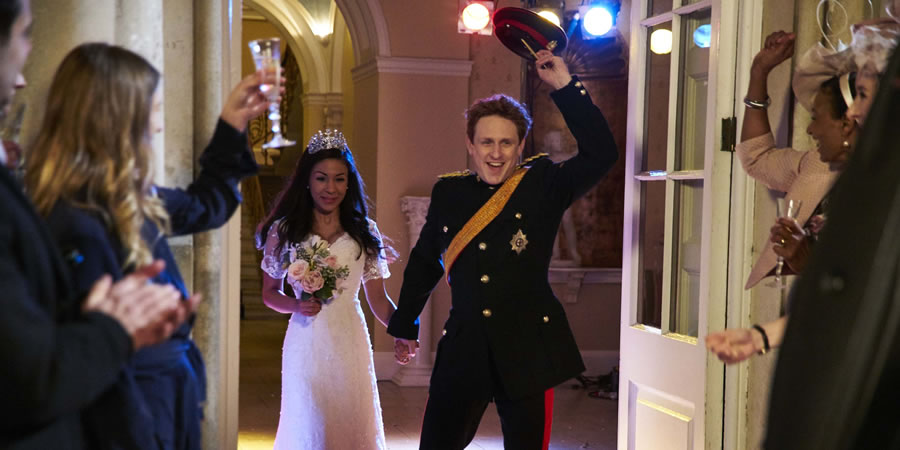 The Windsors. Image shows from L to R: Meghan Markle (Kathryn Drysdale), Harry (Richard Goulding). Copyright: Noho Film and TV. The Windsors. Image shows from L to R: Meghan Markle (Kathryn Drysdale), Harry (Richard Goulding). Copyright: Noho Film and TV.