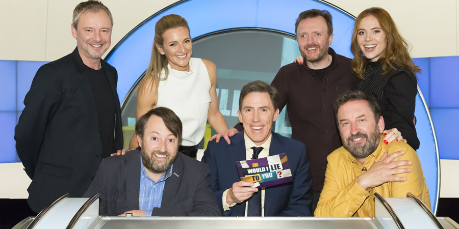 Would I Lie To You?. Image shows from L to R: John Simm, David Mitchell, Gabby Logan, Rob Brydon, Chris McCausland, Lee Mack, Angela Scanlon. Copyright: Zeppotron. Would I Lie To You?. Image shows from L to R: John Simm, David Mitchell, Gabby Logan, Rob Brydon, Chris McCausland, Lee Mack, Angela Scanlon. Copyright: Zeppotron.