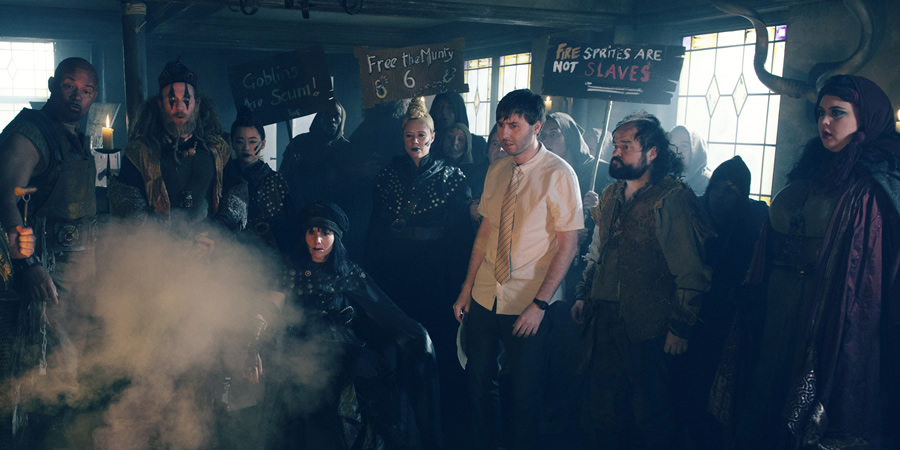 Zapped. Image shows from L to R: Herman (Louis Emerick), Howell (Paul Kaye), Henchwoman (Haruka Abe), Slasher Morgan (Sally Phillips), Unknown, Brian (James Buckley), Howell (Paul Kaye), Barbara (Sharon Rooney). Zapped. Image shows from L to R: Herman (Louis Emerick), Howell (Paul Kaye), Henchwoman (Haruka Abe), Slasher Morgan (Sally Phillips), Unknown, Brian (James Buckley), Howell (Paul Kaye), Barbara (Sharon Rooney).
