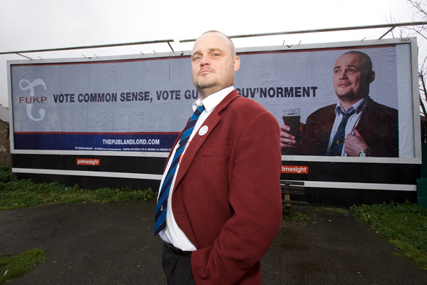 The Pub Landlord v Nigel Farage: The Battle For South Thanet. The Pub Landlord (Al Murray). Copyright: Liberty Bell. The Pub Landlord v Nigel Farage: The Battle For South Thanet. The Pub Landlord (Al Murray). Copyright: Liberty Bell.