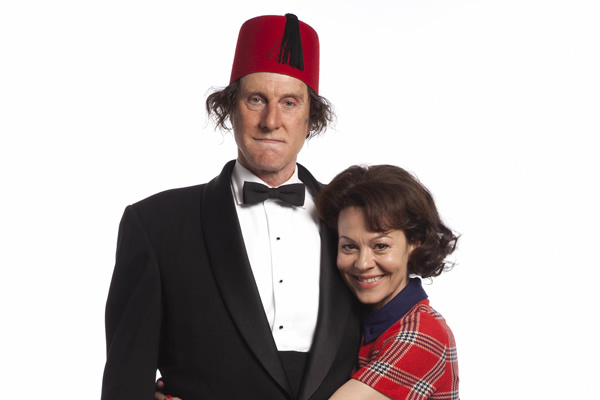 Tommy Cooper: Not Like That, Like This. Image shows from L to R: Tommy Cooper (David Threlfall), Mary Kay (Helen McCrory). Copyright: Left Bank Pictures. Tommy Cooper: Not Like That, Like This. Image shows from L to R: Tommy Cooper (David Threlfall), Mary Kay (Helen McCrory). Copyright: Left Bank Pictures.