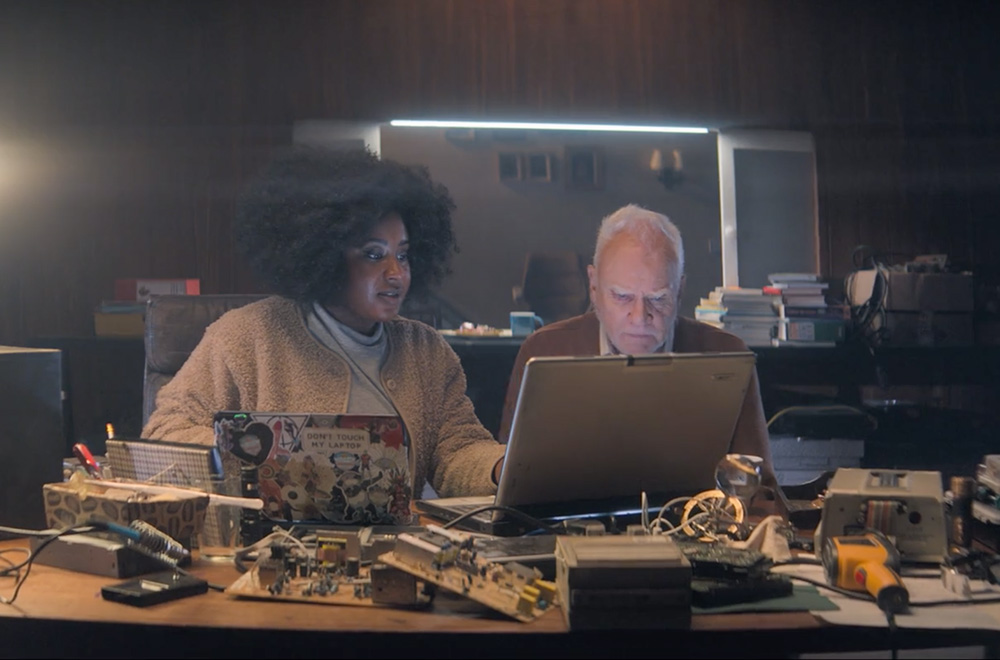 Truth Seekers. Image shows from L to R: Helen (Susan Wokoma), Richard (Malcolm McDowell). Copyright: Stolen Picture. Truth Seekers. Image shows from L to R: Helen (Susan Wokoma), Richard (Malcolm McDowell). Copyright: Stolen Picture.