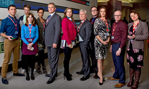 W1A. Image shows from L to R: Jack Patterson (Jonathan Bailey), Will Humphries (Hugh Skinner), Izzy Gould (Ophelia Lovibond), Lucy Freeman (Nina Sosanya), Ian Fletcher (Hugh Bonneville), Siobhan Sharpe (Jessica Hynes), Neil Reid (David Westhead), David Wilkes (Rufus Jones), Anna Rampton (Sarah Parish), Simon Harwood (Jason Watkins), Tracey Pritchard (Monica Dolan). Copyright: BBC. W1A. Image shows from L to R: Jack Patterson (Jonathan Bailey), Will Humphries (Hugh Skinner), Izzy Gould (Ophelia Lovibond), Lucy Freeman (Nina Sosanya), Ian Fletcher (Hugh Bonneville), Siobhan Sharpe (Jessica Hynes), Neil Reid (David Westhead), David Wilkes (Rufus Jones), Anna Rampton (Sarah Parish), Simon Harwood (Jason Watkins), Tracey Pritchard (Monica Dolan). Copyright: BBC.
