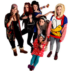 Lady Garden: Top Secret Gig. Image shows from L to R: Eleanor Thom, Jessica Knappett, Hannah Dodd, Rose Johnson, Camille Ucan, Beattie Edmondson. Copyright: BBC. Lady Garden: Top Secret Gig. Image shows from L to R: Eleanor Thom, Jessica Knappett, Hannah Dodd, Rose Johnson, Camille Ucan, Beattie Edmondson. Copyright: BBC.