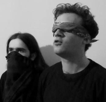 Back and to the Left in the Turkish Prison. Image shows from L to R: Alex Hall, Henry Trotter. Copyright: Angel Eye Media. Back and to the Left in the Turkish Prison. Image shows from L to R: Alex Hall, Henry Trotter. Copyright: Angel Eye Media.