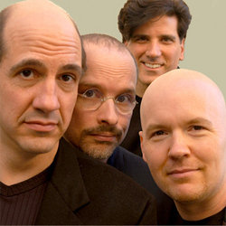 The Blanks' Big Break. Image shows from L to R: Sam Lloyd, Paul F. Perry, George Miserlis, Philip McNiven. The Blanks' Big Break. Image shows from L to R: Sam Lloyd, Paul F. Perry, George Miserlis, Philip McNiven.
