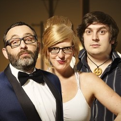 AAA Stand-Up Late. Image shows from L to R: Paul McMullan, Robyn Perkins, George Rigden. Copyright: BBC. AAA Stand-Up Late. Image shows from L to R: Paul McMullan, Robyn Perkins, George Rigden. Copyright: BBC.