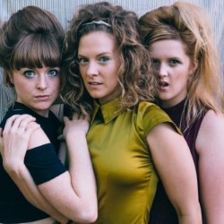The Travelling Sisters. Image shows from L to R: Lucy Fox, Ell Sachs, Laura Trenerry. The Travelling Sisters. Image shows from L to R: Lucy Fox, Ell Sachs, Laura Trenerry.