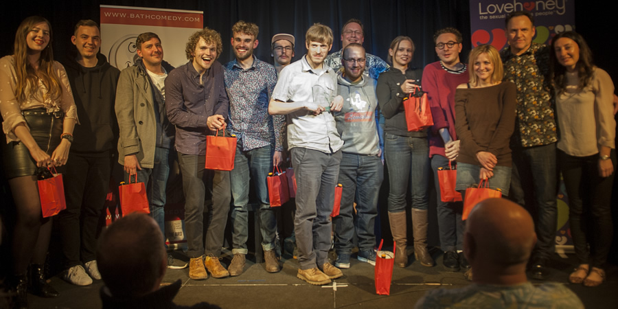 Bath New Act Competition 2019. Image shows from L to R: Chelsea Birkby, Martin Durchov, Nathan Eagle, Michael Cummings, Alex Prescot, Paul Hilleard, David Eagle, Nick Steel, Saban Kasim, Fran Kissling, Will Hall, Jenny Laville, Geoff Whiting, Elaine Sosna. Copyright: Lloyd Ellington. Bath New Act Competition 2019. Image shows from L to R: Chelsea Birkby, Martin Durchov, Nathan Eagle, Michael Cummings, Alex Prescot, Paul Hilleard, David Eagle, Nick Steel, Saban Kasim, Fran Kissling, Will Hall, Jenny Laville, Geoff Whiting, Elaine Sosna. Copyright: Lloyd Ellington.
