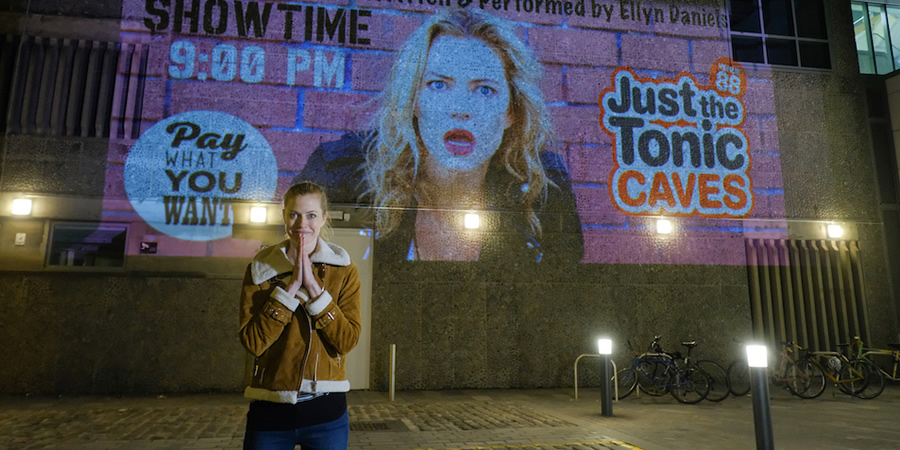 Ellyn Daniels projecting her flyer. Ellyn Daniels. Ellyn Daniels projecting her flyer. Ellyn Daniels.