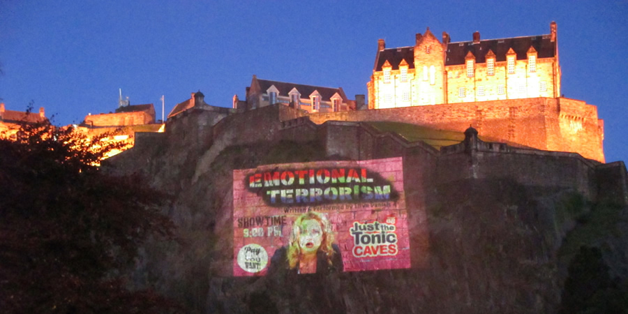 Ellyn Daniels show flyer projected near Edinburgh Castle. Ellyn Daniels show flyer projected near Edinburgh Castle.