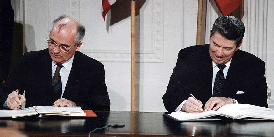 Gorbachev and Reagan sign the INF Treaty. Gorbachev and Reagan sign the INF Treaty.