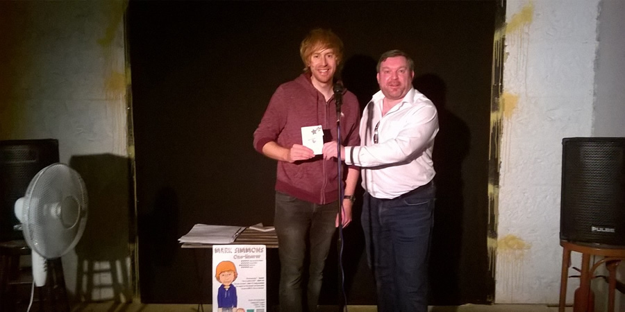 Mark Simmons getting his Harvester 'for being brilliant' badge. Image shows from L to R: Mark Simmons, Unknown. Mark Simmons getting his Harvester 'for being brilliant' badge. Image shows from L to R: Mark Simmons, Unknown.