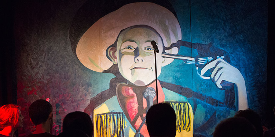 Cowboy picture on the stage at The Stand. Cowboy picture on the stage at The Stand.