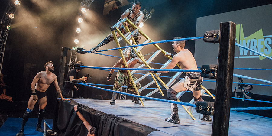 Joel Dommett watches a ladder being positioned at The Wrestling 2017. Copyright: David Monteith-Hodge. Joel Dommett watches a ladder being positioned at The Wrestling 2017. Copyright: David Monteith-Hodge.