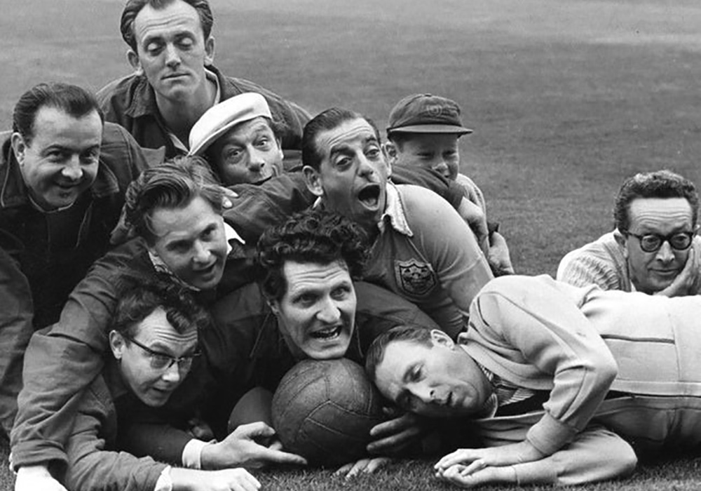 Comedians including Morecambe & Wise and Tommy Cooper with a football. Comedians including Morecambe & Wise and Tommy Cooper with a football.