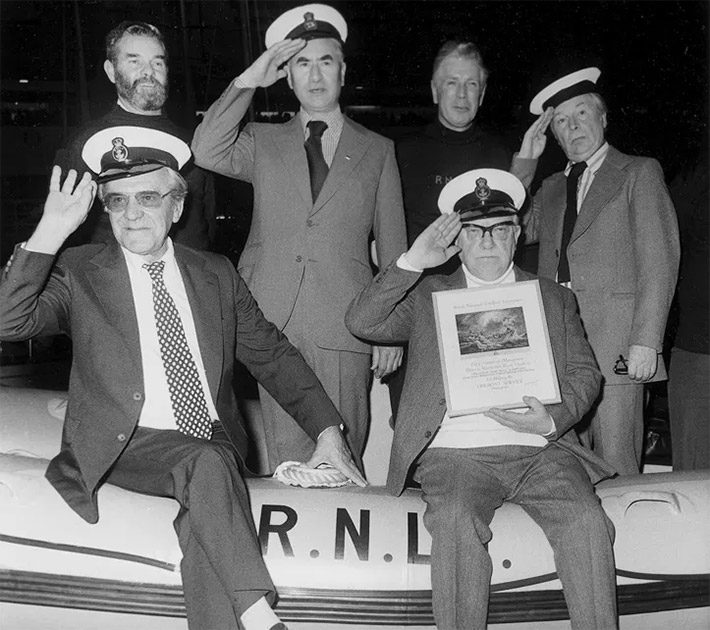 John Le Mesurier, Bill Pertwee, Arthur Lowe and Clive Dunn with two RNLI sailors at the 1977 Boat Show. Image shows from L to R: John Le Mesurier, Bill Pertwee, Arthur Lowe, Clive Dunn. John Le Mesurier, Bill Pertwee, Arthur Lowe and Clive Dunn with two RNLI sailors at the 1977 Boat Show. Image shows from L to R: John Le Mesurier, Bill Pertwee, Arthur Lowe, Clive Dunn.
