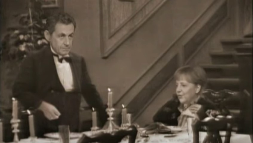 President Sarkozy and Chancellor Merkel pictured in a 2011 Dinner For One parody. President Sarkozy and Chancellor Merkel pictured in a 2011 Dinner For One parody.
