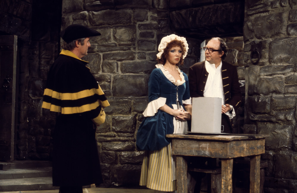 Ernie Wise as a coachman, Dilys Watling as a serving girl and Eric Morecambe as Dick Turpin, 07/01/1976. Copyright: BBC History. Ernie Wise as a coachman, Dilys Watling as a serving girl and Eric Morecambe as Dick Turpin, 07/01/1976. Copyright: BBC History.