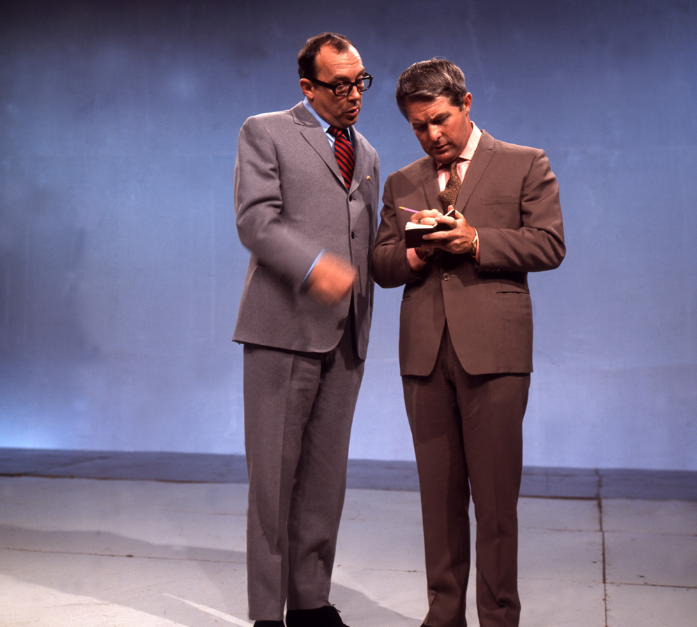 Eric Morecambe and Ernie Wise on stage, 02/09/1968. Image shows from L to R: Eric Morecambe, Ernie Wise. Copyright: BBC History. Eric Morecambe and Ernie Wise on stage, 02/09/1968. Image shows from L to R: Eric Morecambe, Ernie Wise. Copyright: BBC History.