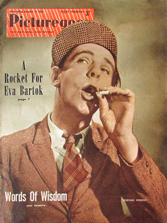 Cover of Picturegoer magazine for the week ending 12th December 1953. Norman Wisdom. Cover of Picturegoer magazine for the week ending 12th December 1953. Norman Wisdom.