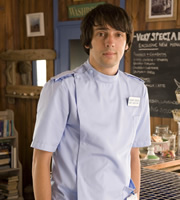 The Café. Richard Dickens (Ralf Little). Copyright: Jellylegs. The Café. Richard Dickens (Ralf Little). Copyright: Jellylegs.