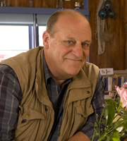 The Café. Stan Astill (David Troughton). Copyright: Jellylegs. The Café. Stan Astill (David Troughton). Copyright: Jellylegs.