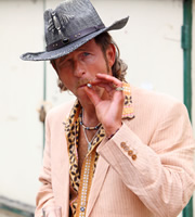 Candy Cabs. Dennis Whitehead (Paul Kaye). Copyright: Splash Media. Candy Cabs. Dennis Whitehead (Paul Kaye). Copyright: Splash Media.