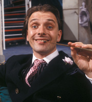 Filthy Rich & Catflap. Richie Rich (Rik Mayall). Copyright: BBC. Filthy Rich & Catflap. Richie Rich (Rik Mayall). Copyright: BBC.