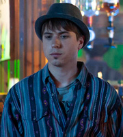 Fresh Meat. Kingsley (Joe Thomas). Copyright: Objective Productions / Lime Pictures. Fresh Meat. Kingsley (Joe Thomas). Copyright: Objective Productions / Lime Pictures.