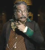 Terry Pratchett's Going Postal. Crispin Horsefly (Madhav Sharma). Copyright: The Mob Film Co. Terry Pratchett's Going Postal. Crispin Horsefly (Madhav Sharma). Copyright: The Mob Film Co.