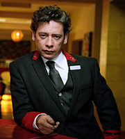 Hotel Babylon. Tony Casemore (Dexter Fletcher). Copyright: Carnival Films. Hotel Babylon. Tony Casemore (Dexter Fletcher). Copyright: Carnival Films.