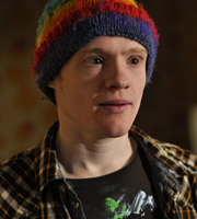 Ideal. Marco (Andrew Lawrence). Copyright: Baby Cow Productions. Ideal. Marco (Andrew Lawrence). Copyright: Baby Cow Productions.