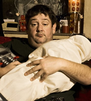 Ideal. Moz (Johnny Vegas). Copyright: Baby Cow Productions. Ideal. Moz (Johnny Vegas). Copyright: Baby Cow Productions.