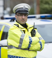 Scot Squad. PC Surjit Singh (Manjot Sumal). Copyright: The Comedy Unit. Scot Squad. PC Surjit Singh (Manjot Sumal). Copyright: The Comedy Unit.