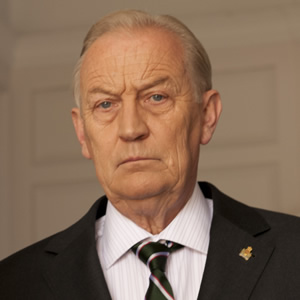 The Royal Bodyguard. Colonel Dennis Whittington (Geoffrey Whitehead). Copyright: Hat Trick Productions / Busby Productions. The Royal Bodyguard. Colonel Dennis Whittington (Geoffrey Whitehead). Copyright: Hat Trick Productions / Busby Productions.