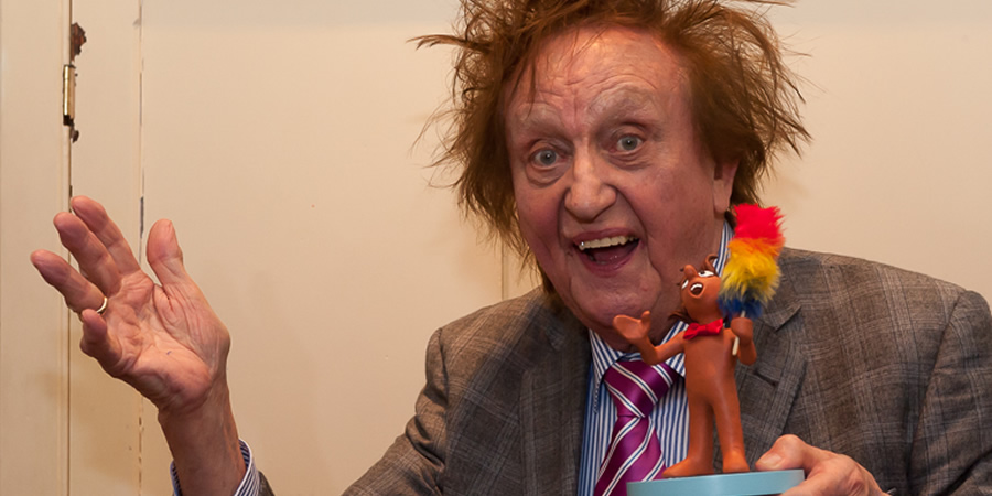 Ken Dodd receiving the Aardman Slapstick Comedy Legend Award. Ken Dodd. Ken Dodd receiving the Aardman Slapstick Comedy Legend Award. Ken Dodd.