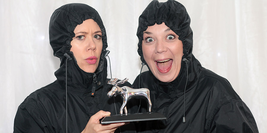 The Kagools with their Amused Moose Comedy Award trophy. The Kagools with their Amused Moose Comedy Award trophy.